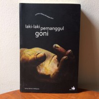 Laki laki pemanggul goni